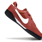 Chuteira Nike Terra Manta Society